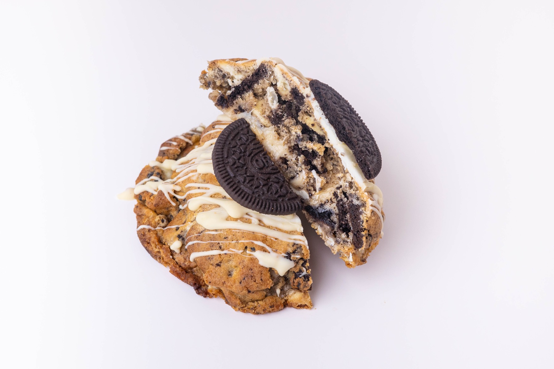 A stack of loaded Bocados Grand Cookies baked in small batches